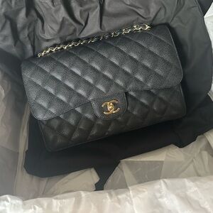 Chanel Jumbo Classic Flap Black Caviar Golf hardware
